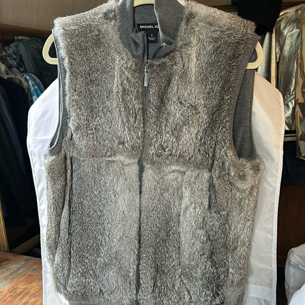 MICHAEL KORS men’s sleeveless zip front fur vest.